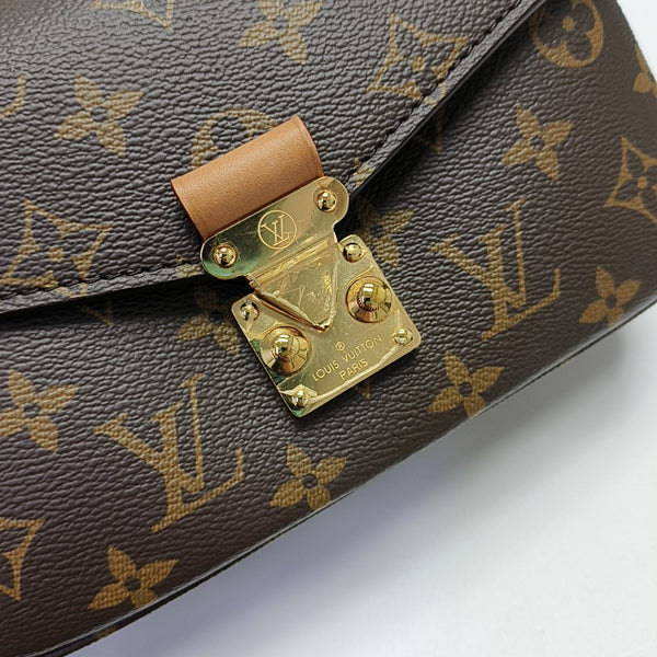 MÉTIS EAST WEST Monogram Coated Canvas Brown
