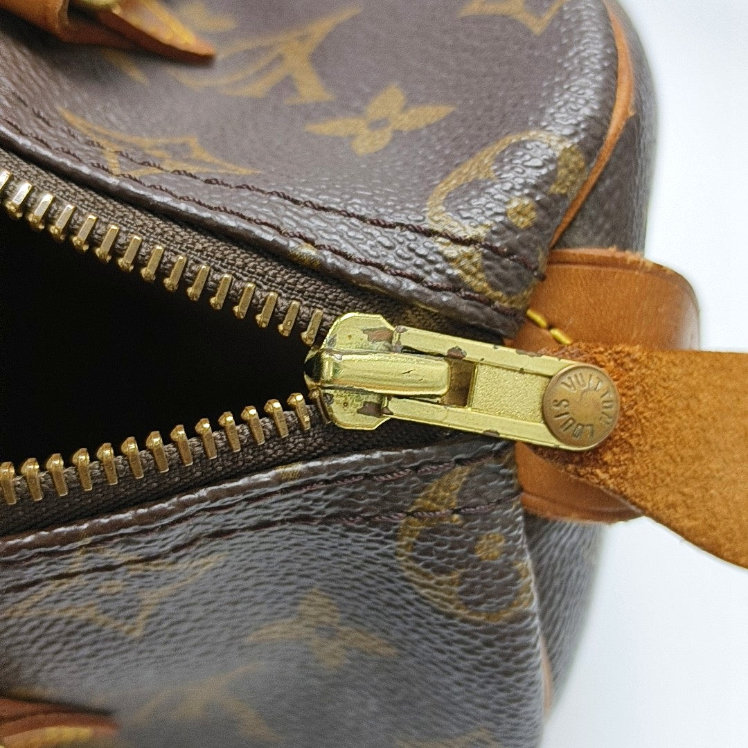 Authenticated pre-owned  SPEEDY 25 Monogram Coated Canvas Brown - Top Handle Bag at Looply