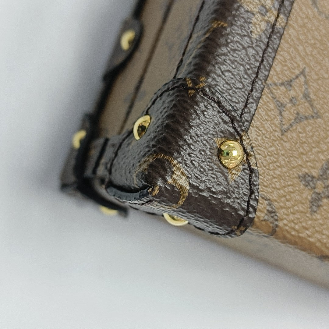 PETITE MALLE Monogram Coated Canvas Brown