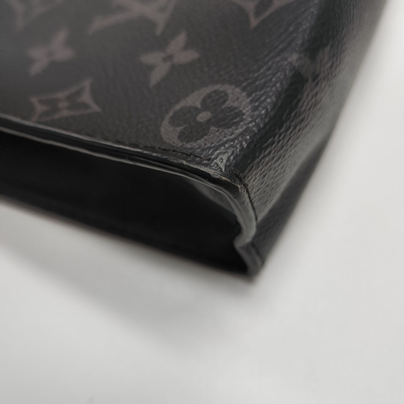 Pochette Voyag MM Monogram Coated Canvas Black