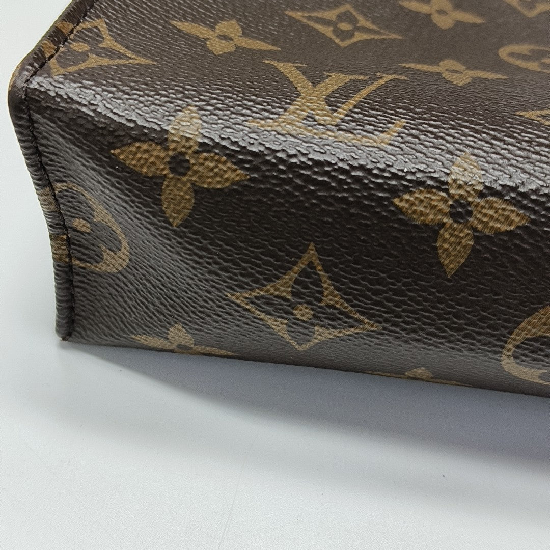 TOILET POCKET 26 Monogram Coated Canvas Brown