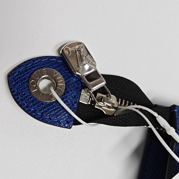 Pochette Voyag MM Monogram Coated Canvas Blue
