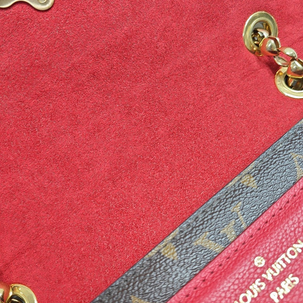 VICTOIRE Monogram Coated Canvas Brown