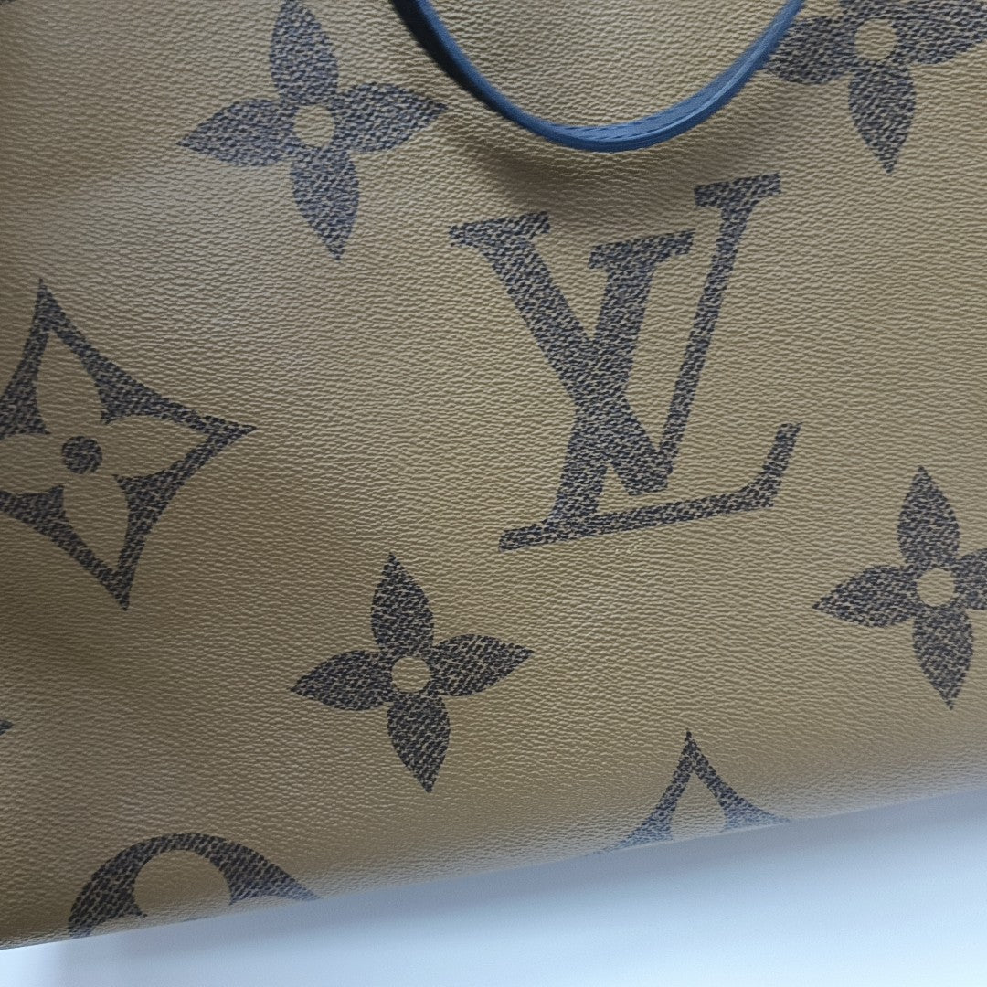 ONTHEGO GM Monogram Coated Canvas Brown