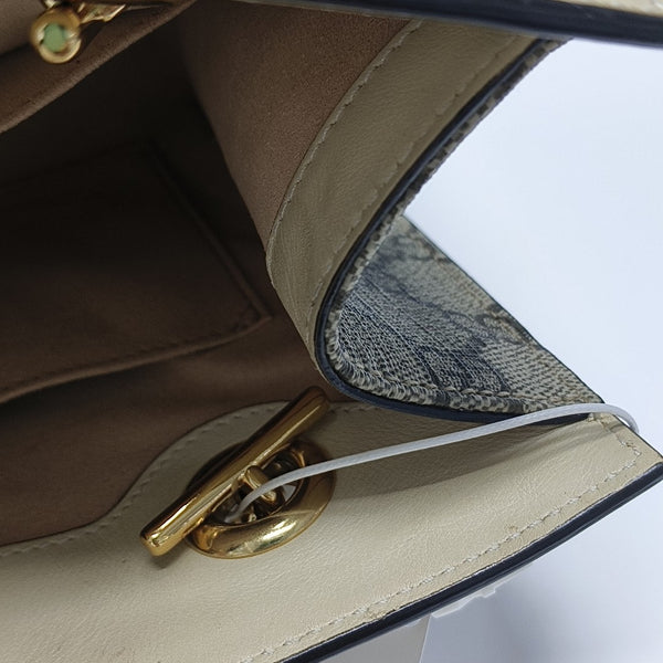 Padlock Small Monogram Coated Canvas Beige