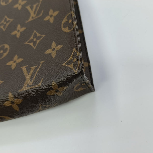 TOILET POCKET 26 Monogram Coated Canvas Brown