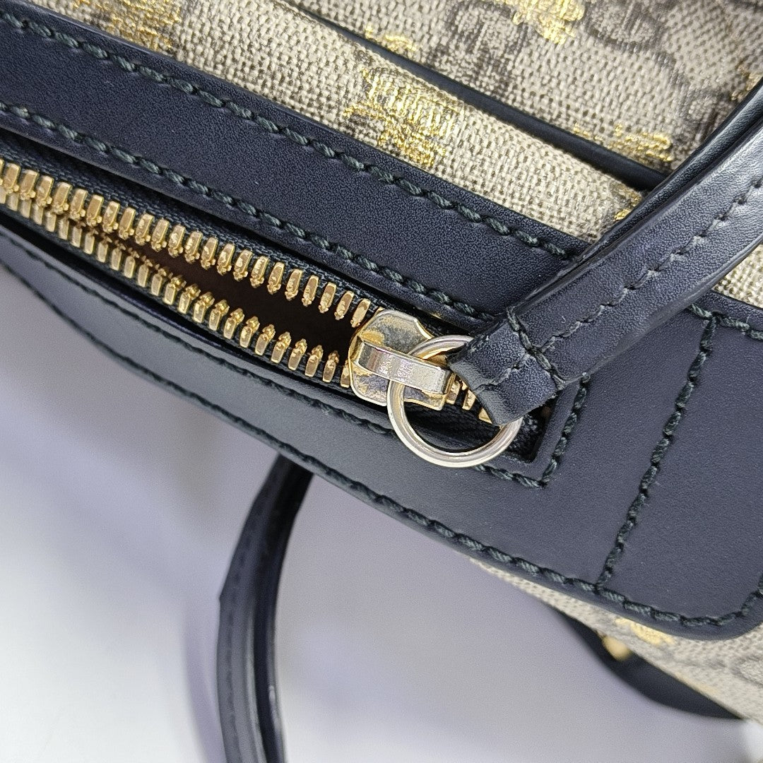 Eden Monogram Coated Canvas Beige