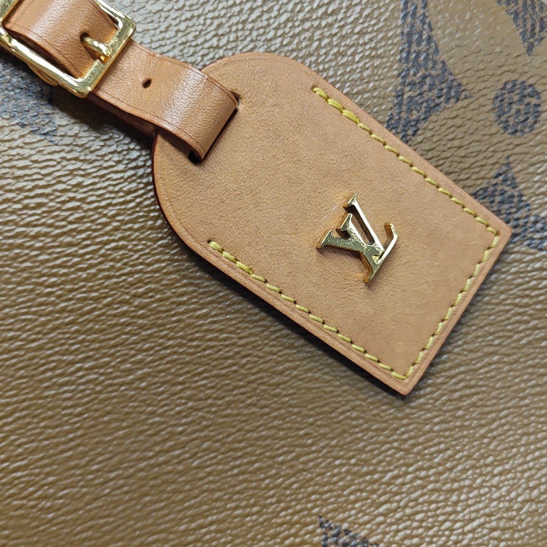 BOITE CHAPEAU MM Monogram Coated Canvas Brown