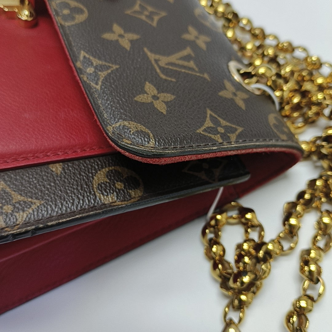 VICTOIRE Monogram Coated Canvas Brown