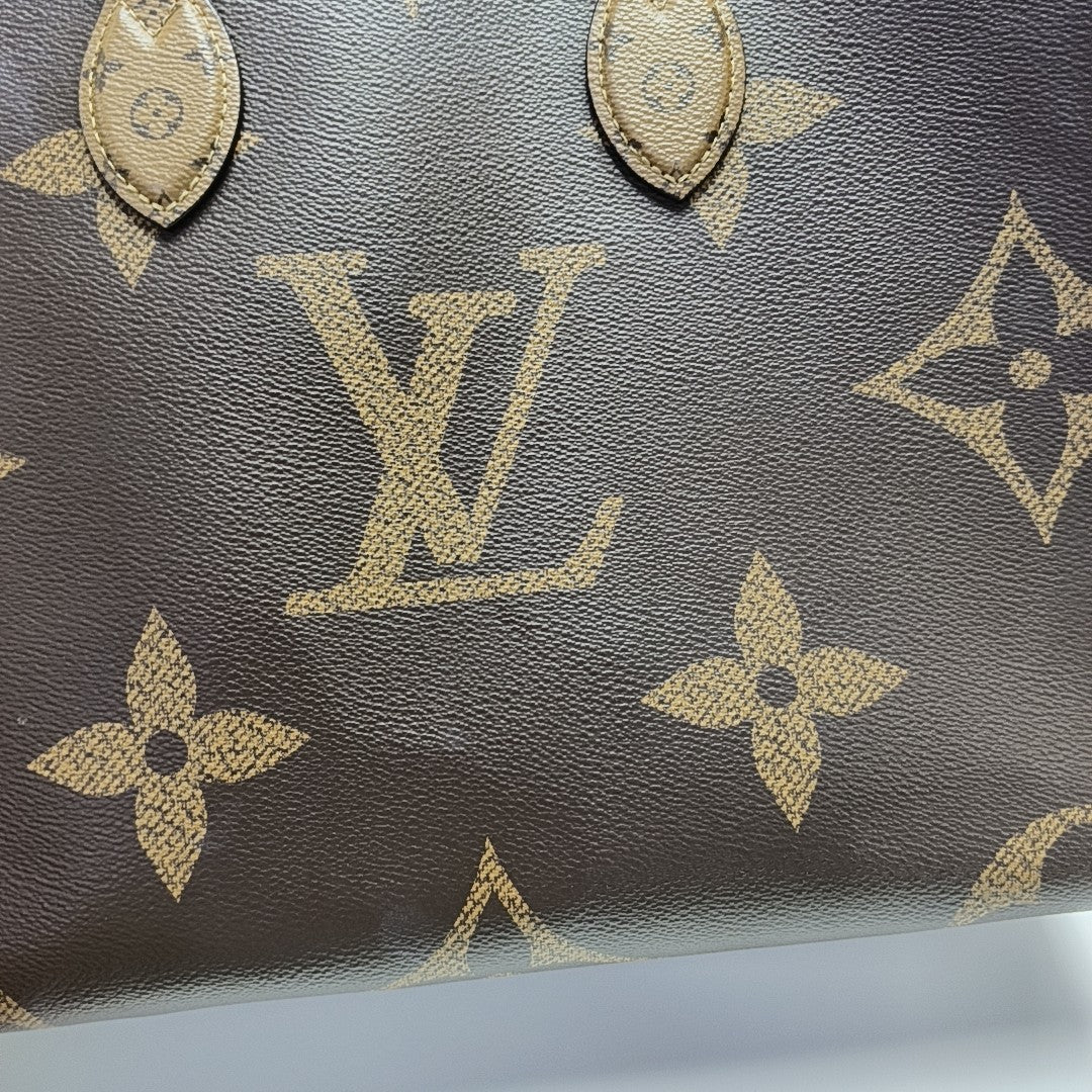 ONTHEGO MM Monogram Coated Canvas Brown