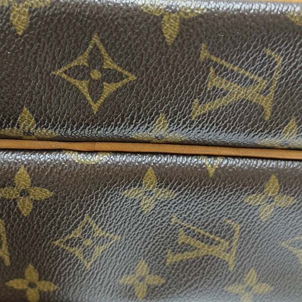 REPORTER Monogram Coated Canvas Brown
