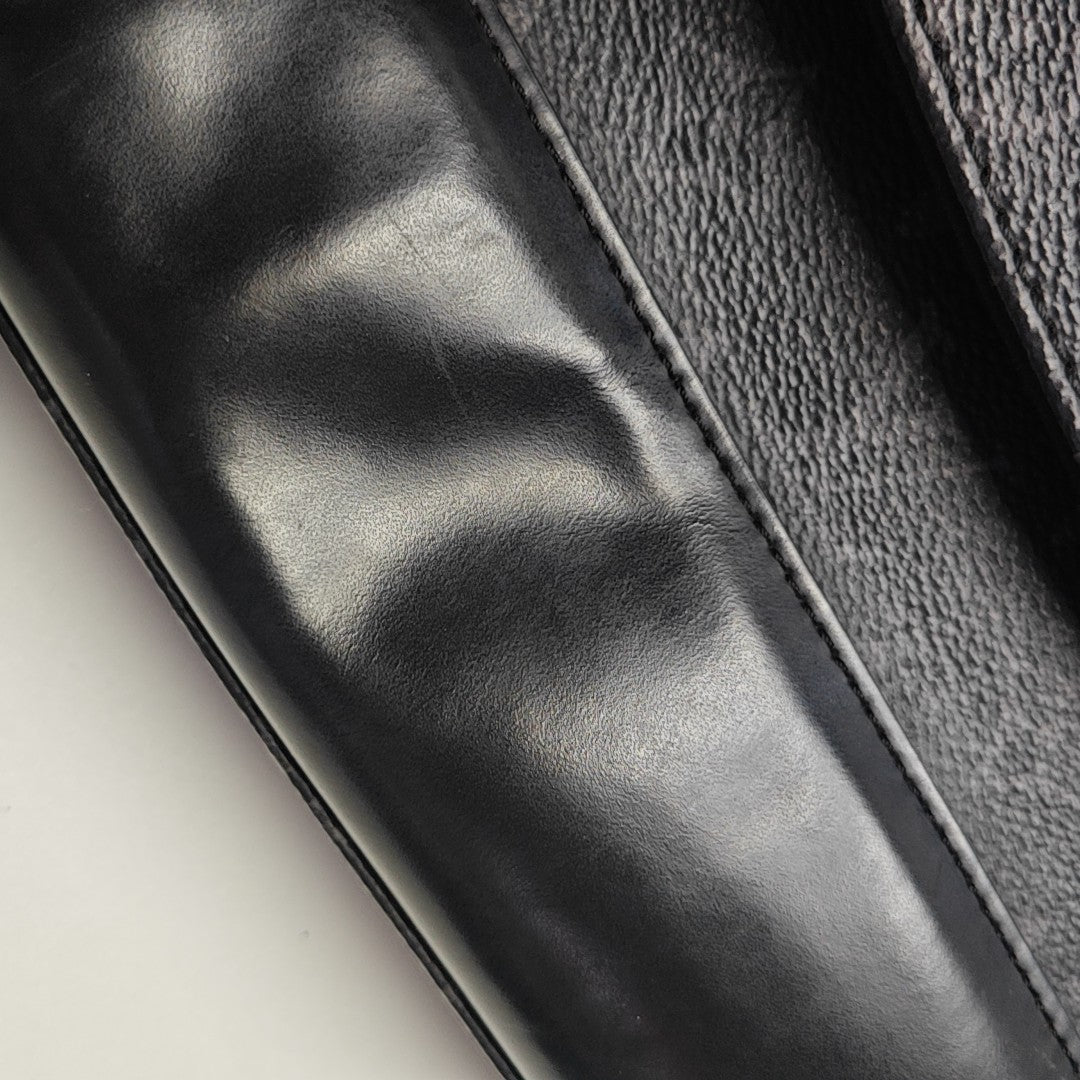 VOYAGER PM Monogram Coated Canvas Black