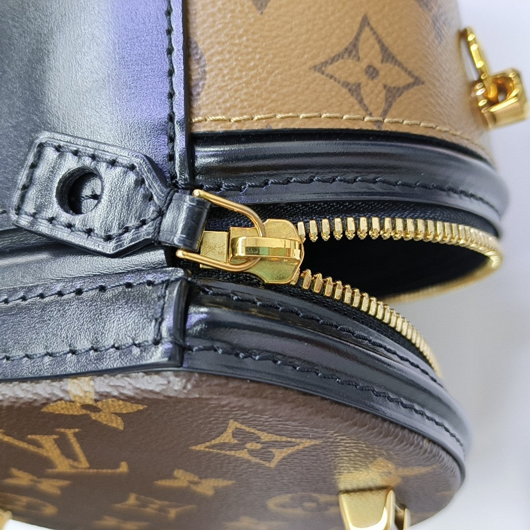 CANNES PM Monogram Coated Canvas Brown