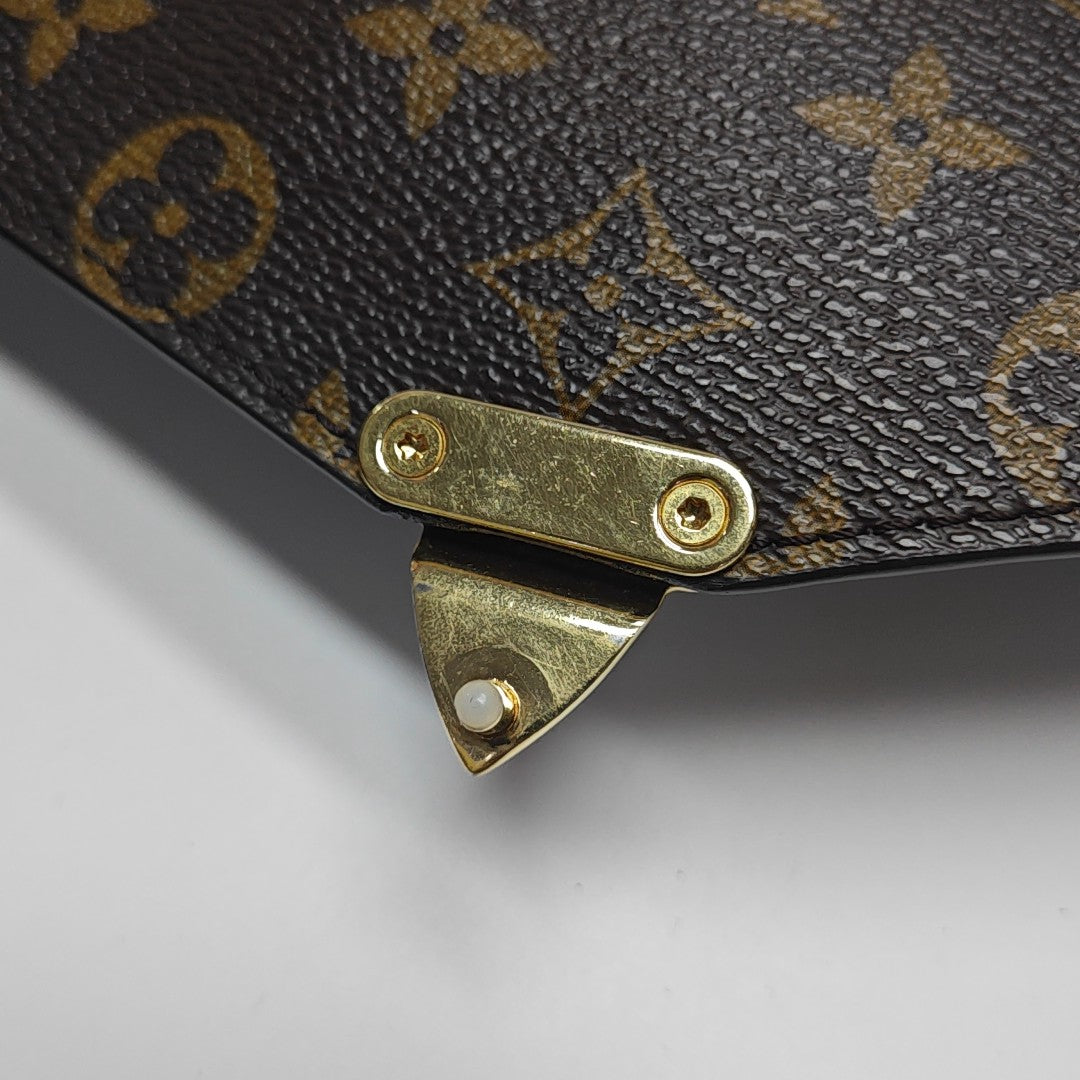 MÉTIS MM Monogram Coated Canvas Brown