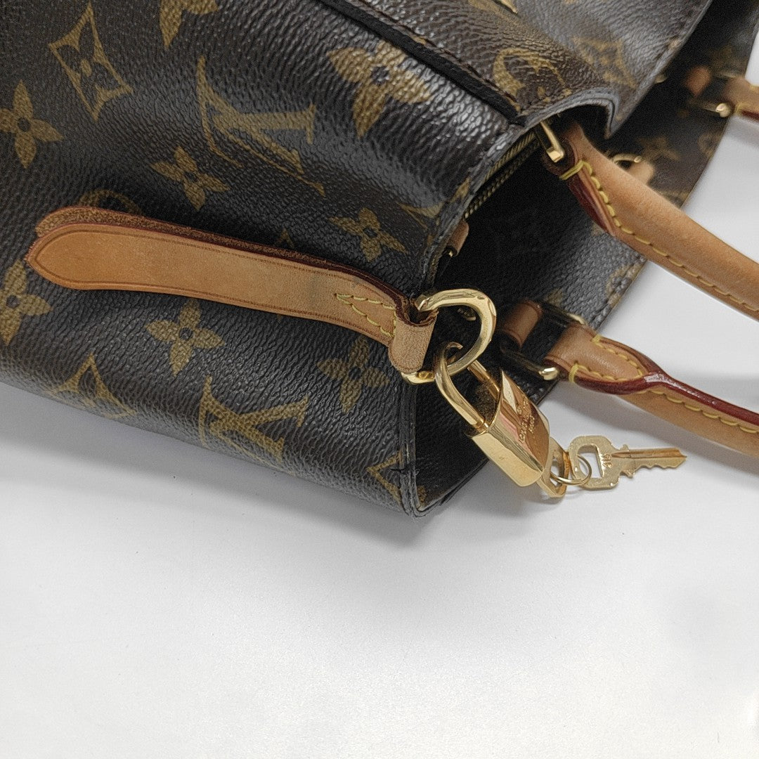 MONTAIGNE GM Monogram Coated Canvas Brown