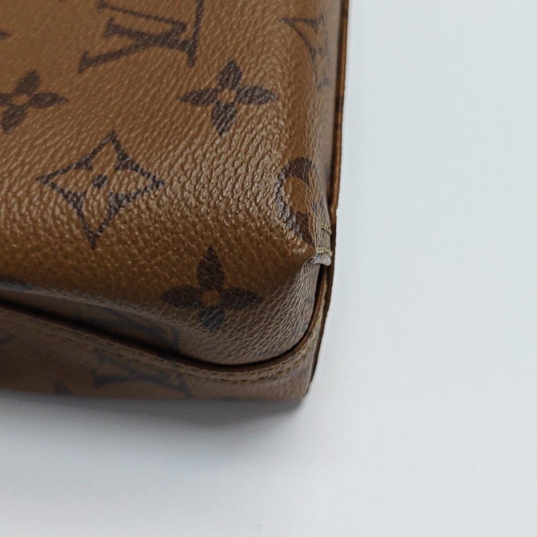 ATLANTIS PM Monogram Coated Canvas Brown