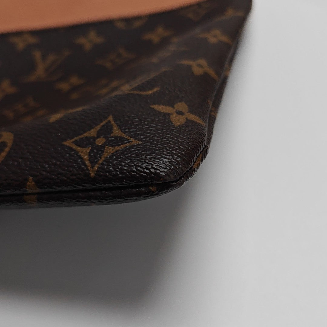DAILY Monogram Coated Canvas Brown