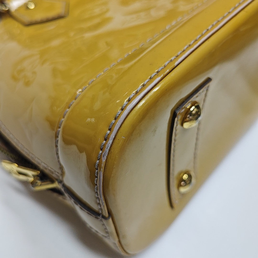 ALMA BB Monogram Patent Leather Yellow