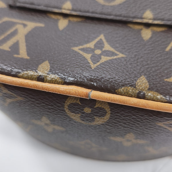 JUST IN CASE Monogram Coated Canvas Brown
