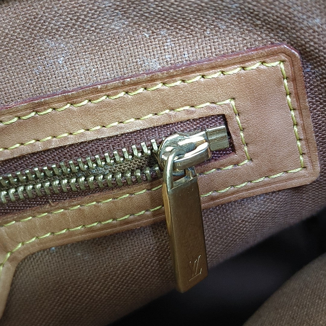 PIANO Monogram Coated Canvas Brown