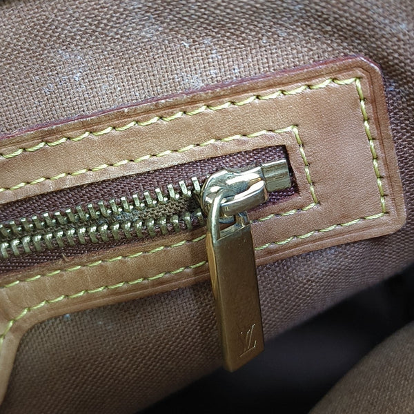 PIANO Monogram Coated Canvas Brown