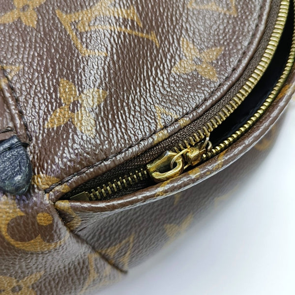 Authenticated pre-owned  PALM SPRINGS Mini Monogram Coated Canvas Brown - Backpack at Looply