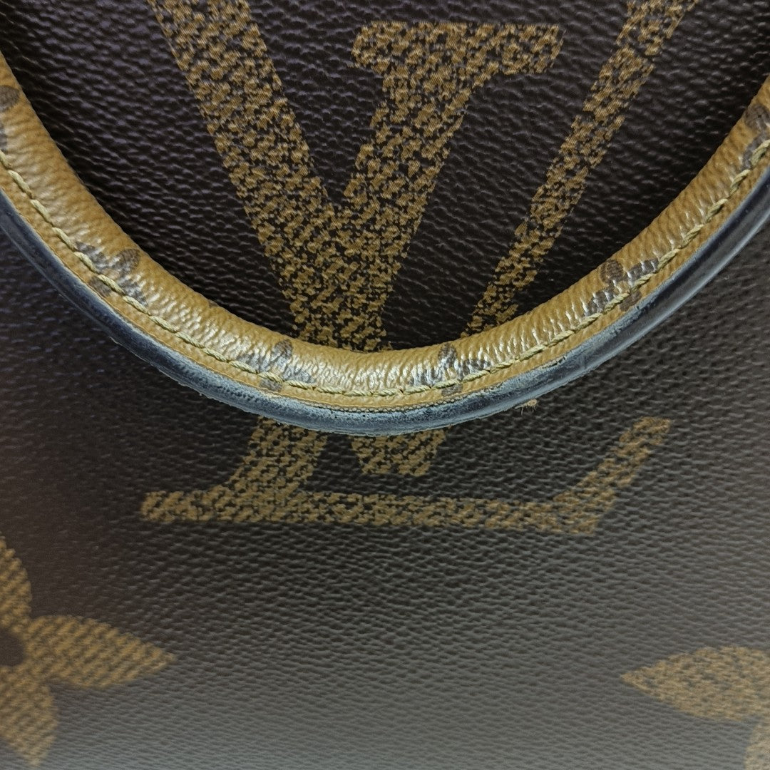 ONTHEGO MM Monogram Coated Canvas Brown