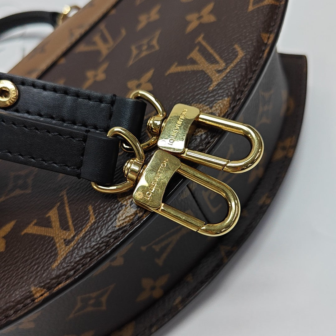 EDEN Monogram Coated Canvas Brown