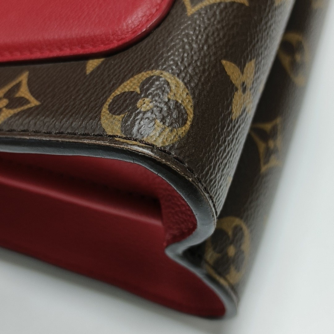 VICTOIRE Monogram Coated Canvas Brown