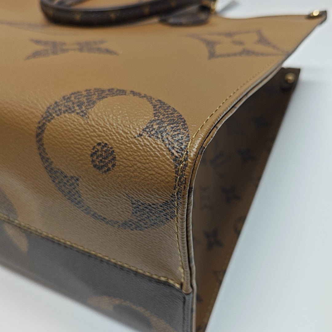 ONTHEGO MM Monogram Coated Canvas Brown