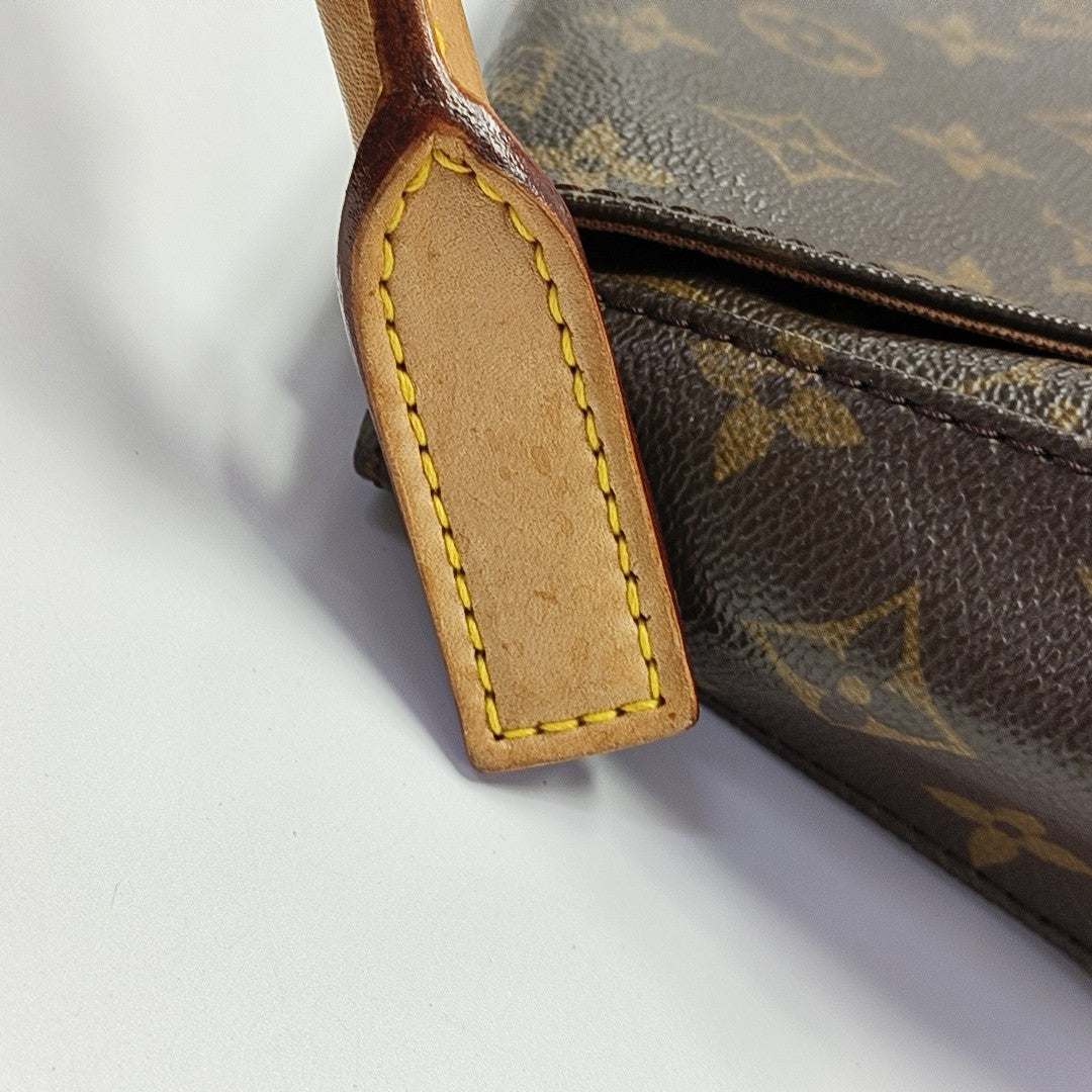 LOOPING PM Monogram Coated Canvas Brown