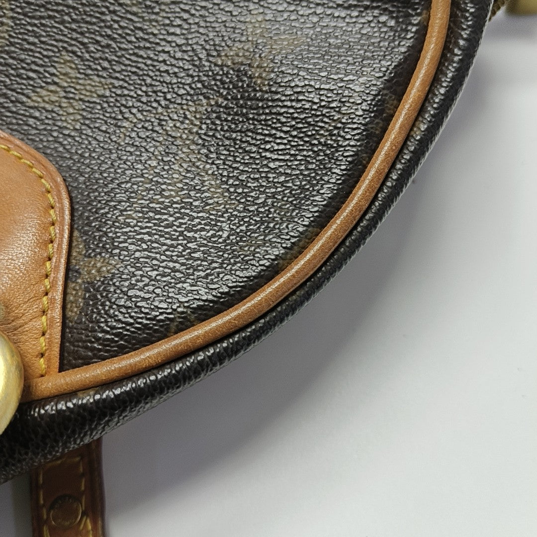 MONTORGUEI Monogram Coated Canvas Brown