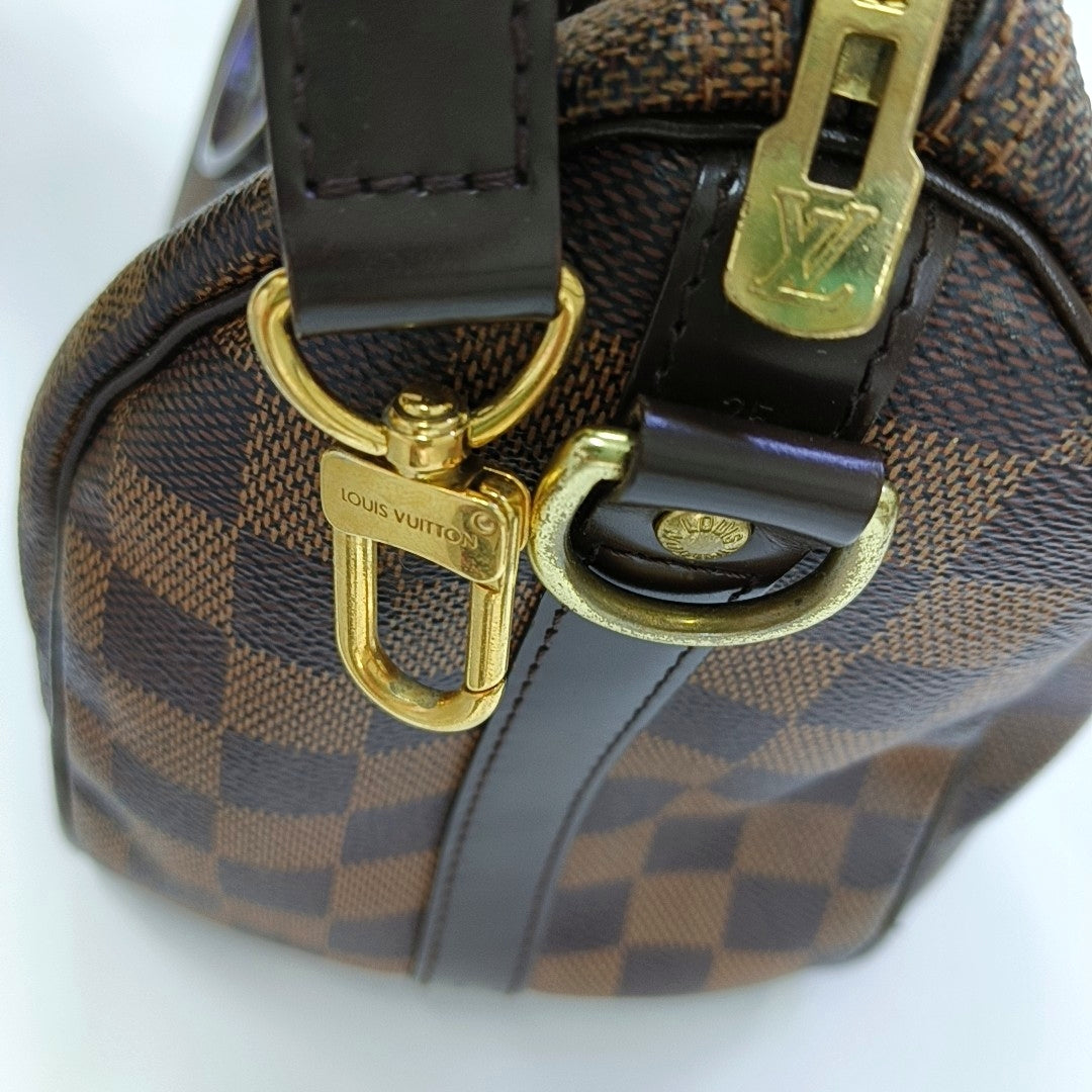 Authenticated pre-owned  SPEEDY 25 Coated Canvas Brown - Shoulder Bag at Looply