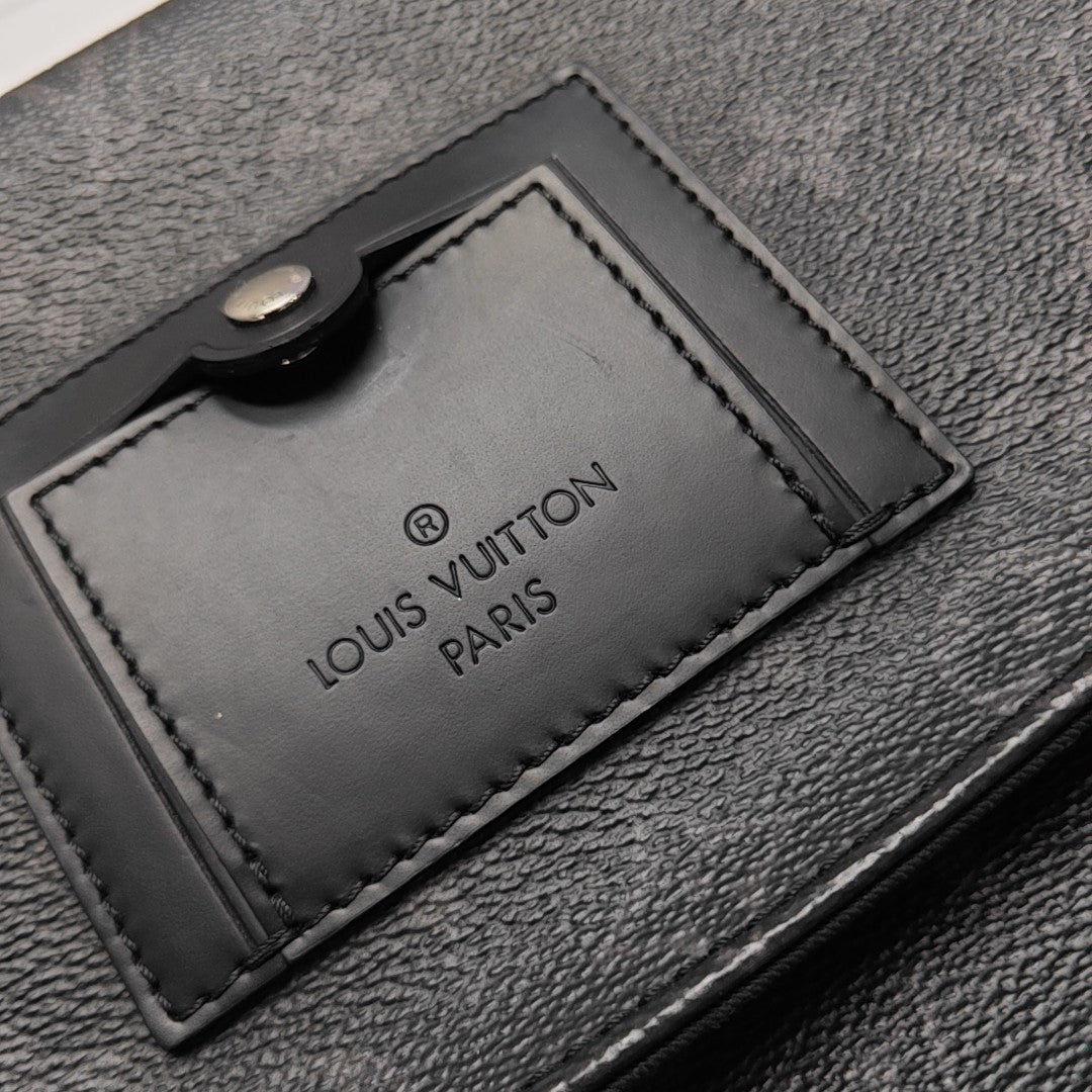 VOYAGER PM Monogram Coated Canvas Black