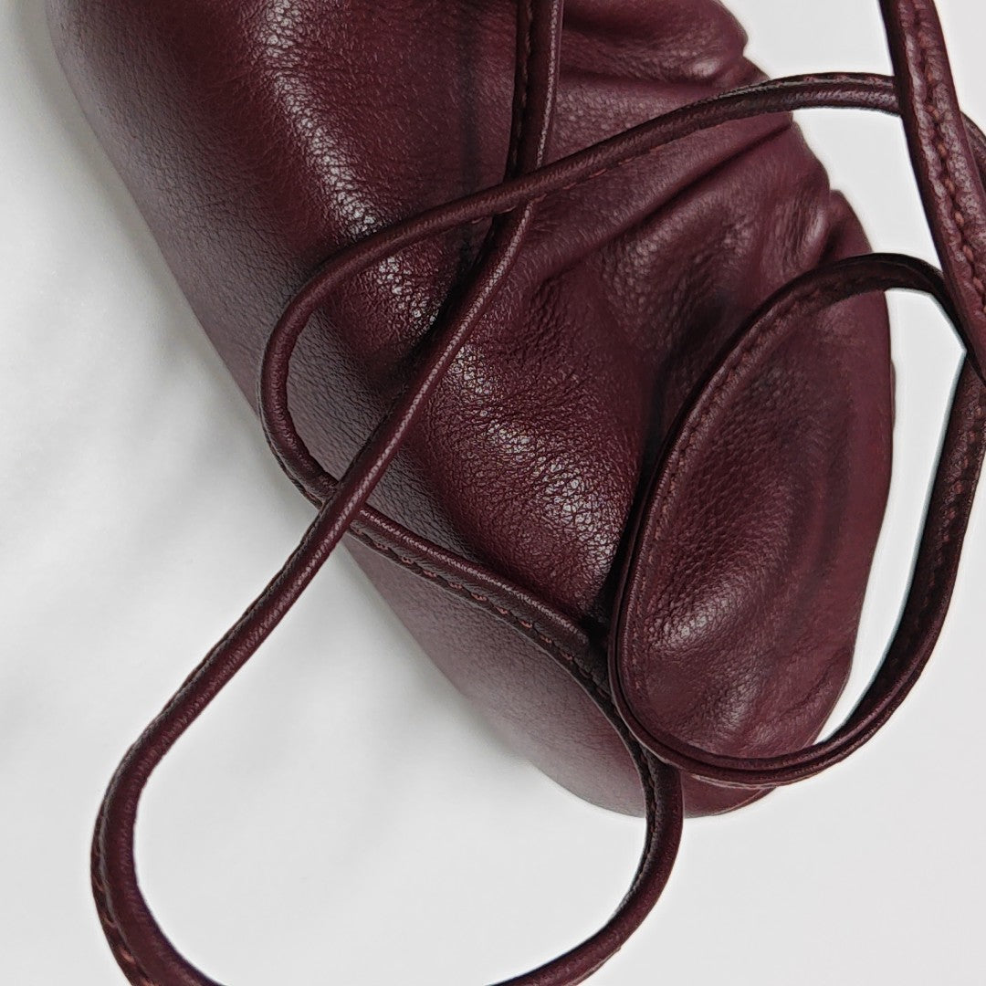 Authenticated pre-owned  The Pouch Calfskin Red - Shoulder Bag at Looply