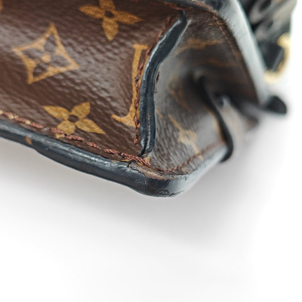 TRUNK Monogram Coated Canvas Brown