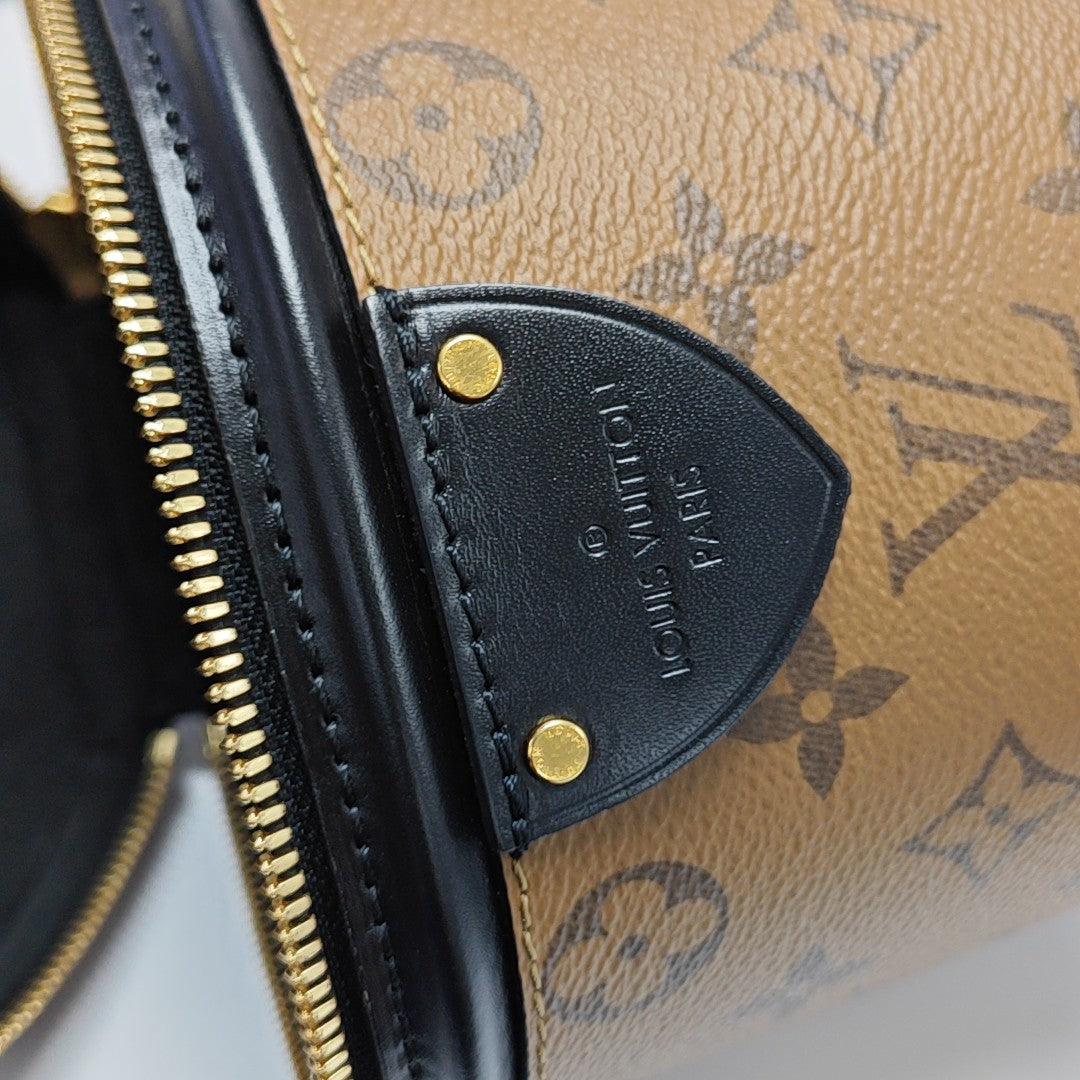 CANNES PM Monogram Coated Canvas Brown
