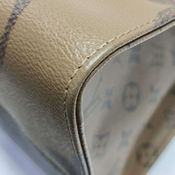 ONTHEGO GM Monogram Coated Canvas Brown