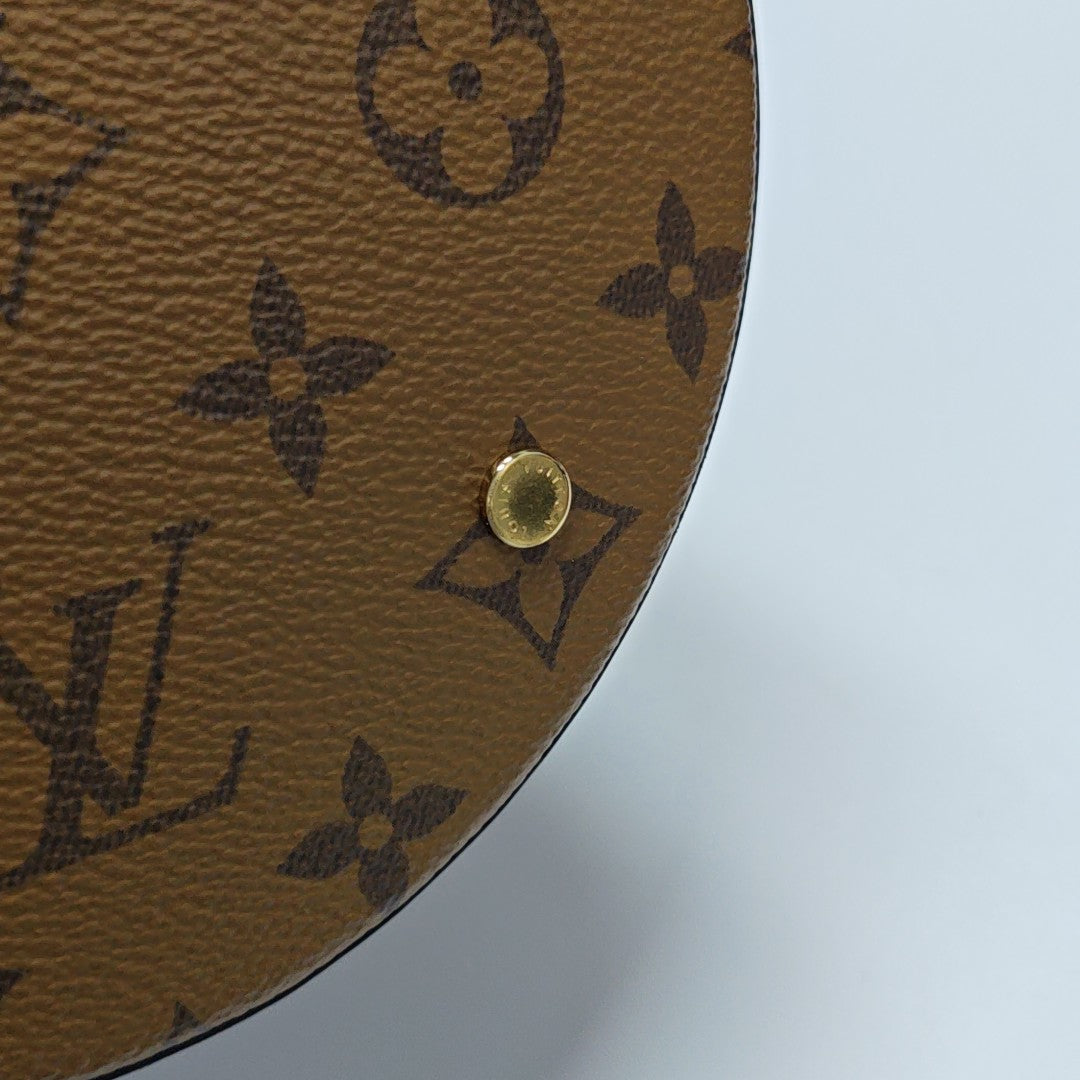 CANNES PM Monogram Coated Canvas Brown