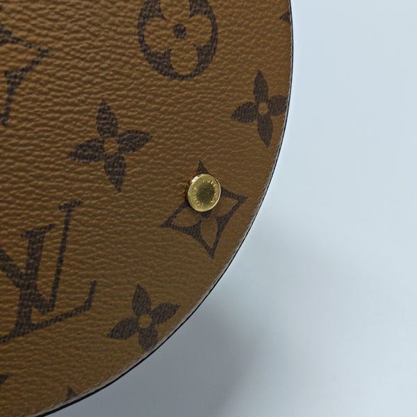 CANNES PM Monogram Coated Canvas Brown