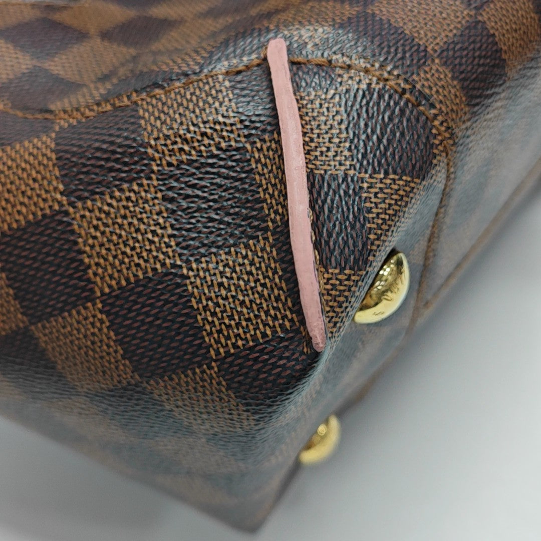 CAÏSSA PM Damier Ebene Coated Canvas Brown