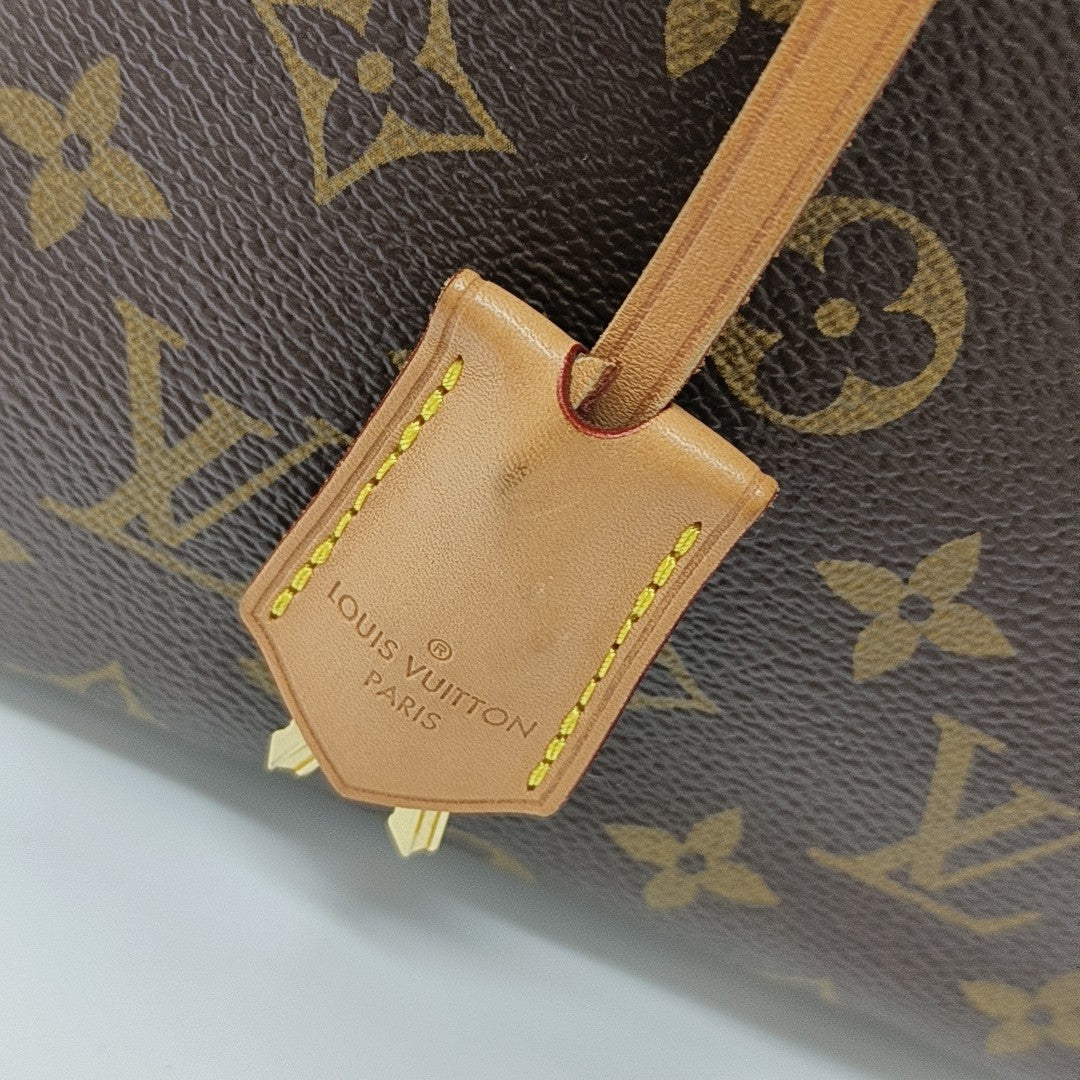 MONTAIGNE Monogram Coated Canvas Brown