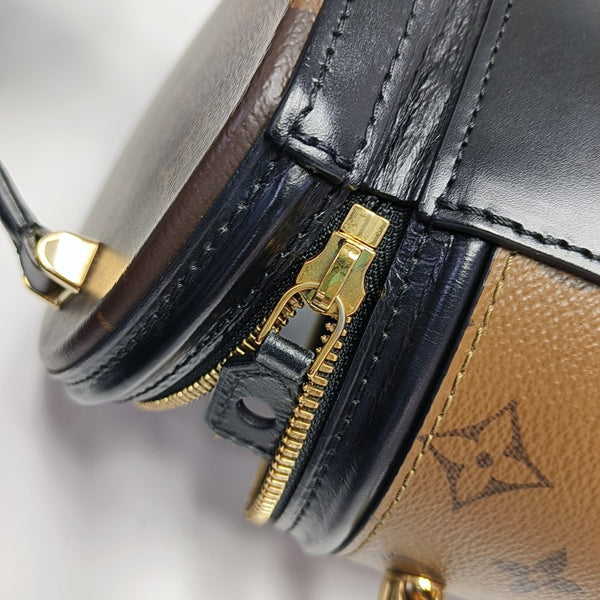 CANNES PM Monogram Coated Canvas Brown