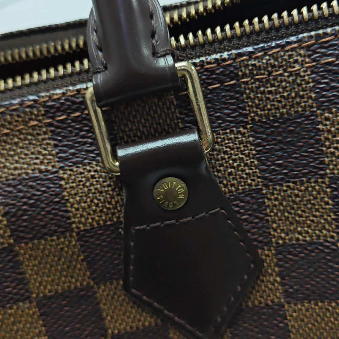 SPEEDY 25 Damier Ebene Coated Canvas Brown