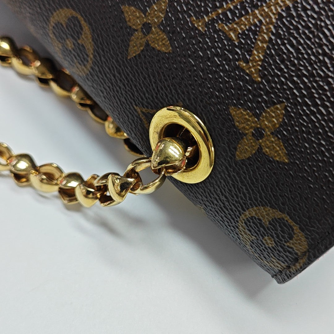 VICTOIRE Monogram Coated Canvas Brown