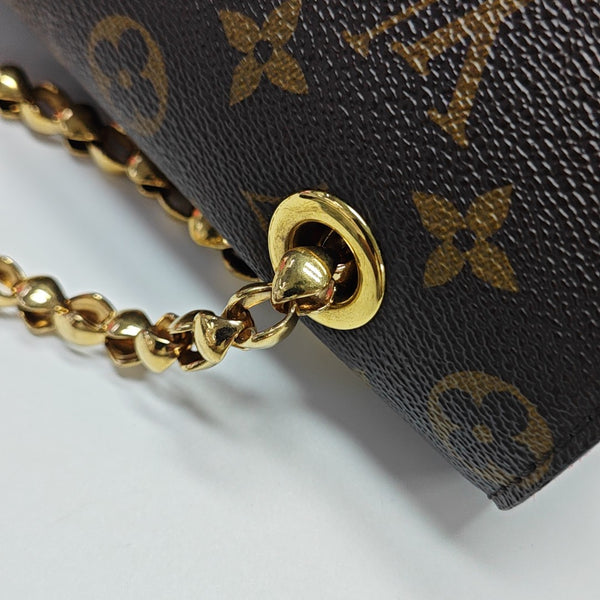 VICTOIRE Monogram Coated Canvas Brown