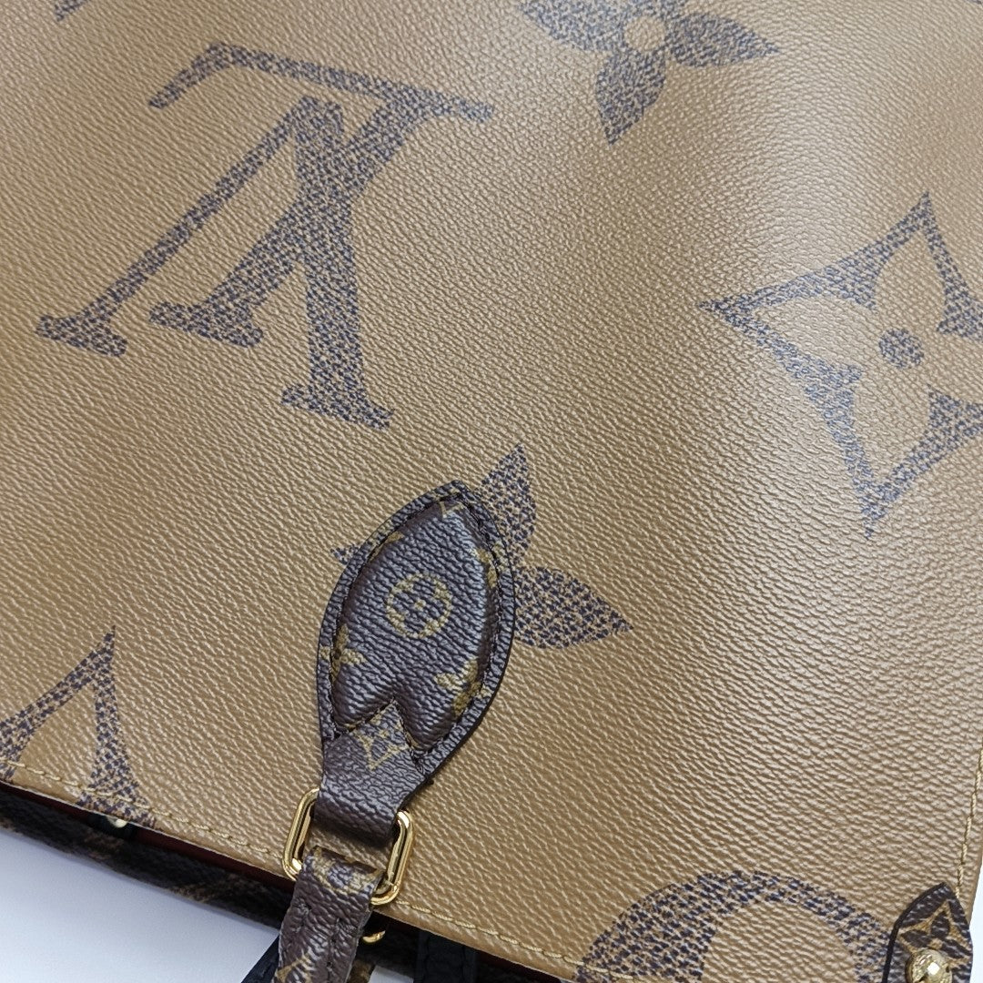 ONTHEGO MM Monogram Coated Canvas Brown