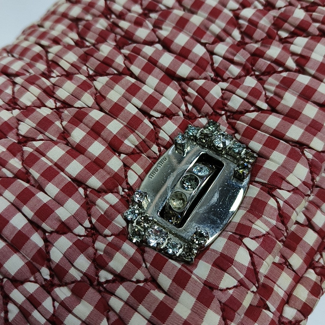 Bolso bandolera de tela acolchada rojo