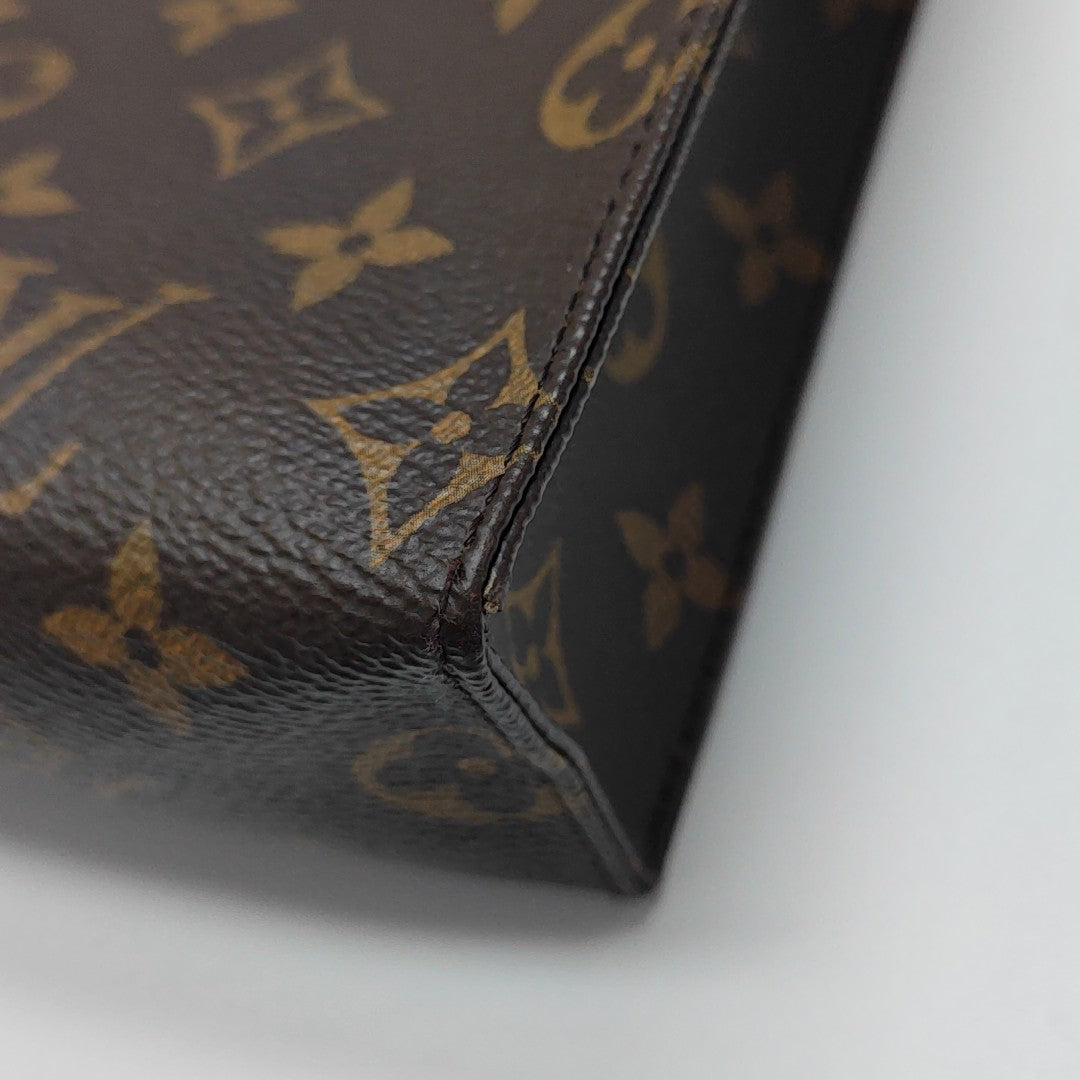 TOILET POCKET 26 Monogram Coated Canvas Brown
