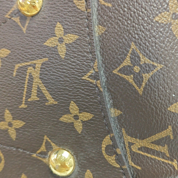 MONTAIGNE GM Monogram Coated Canvas Brown